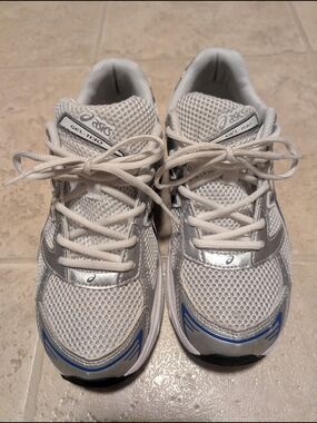 ASICS GEL-1130 Athletic Sneakers in White and Silver with Blue Accent